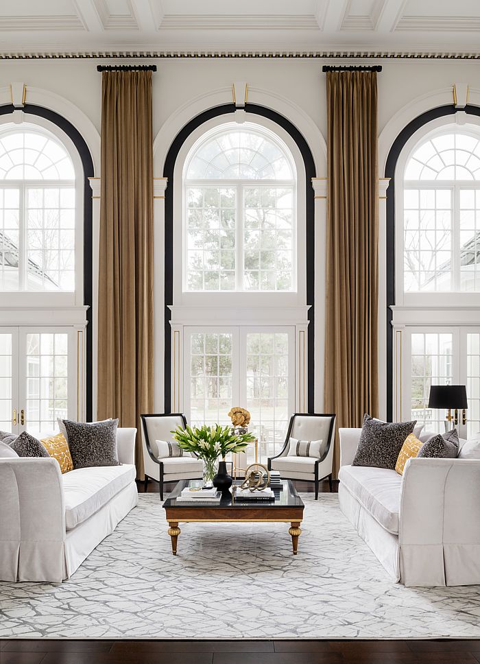 Tall ceilings can be challenging with very high windows. Hiring an interior designer will save time and money.